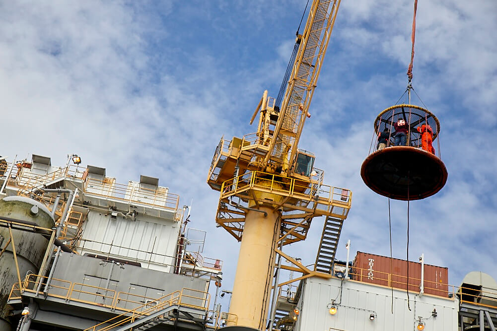Team members being lifted